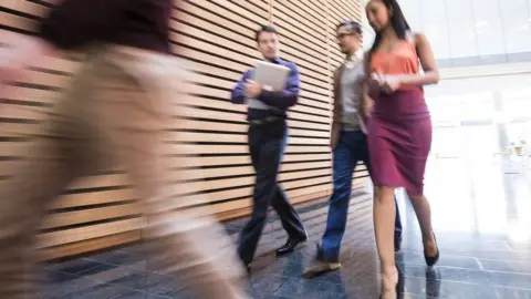 Getty Images men and women in office