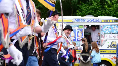 Pacemaker Orangemen marching at the Twelfth parade in Ballyclare