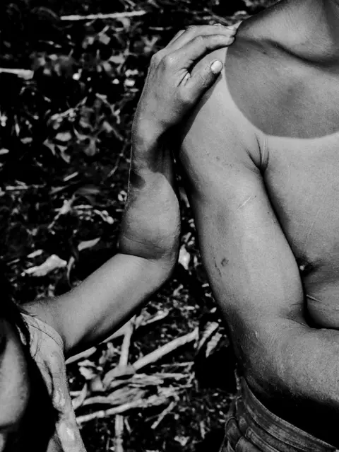 Jorge Panchoaga Hand resting on a shoulder