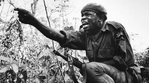 Getty Images Africa, Nigeria civil war, Biafra, at the front line, young officer ordering an attack.