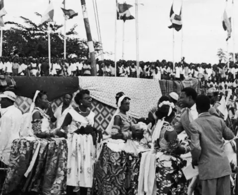 Getty Images A cultural troupe performs during celebrations to mark Nigeria's independence in 1960