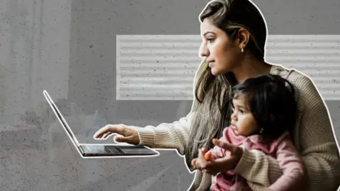 BBC Woman and child looking at a computer
