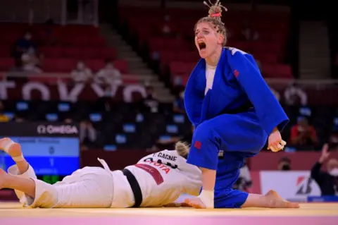 Getty Images Cherine Abdellaoui of Team Algeria celebrates after winning in the Women's -52kg Judo on day 3 of the Tokyo 2020 Paralympic Games at Nippon Budokan on August 27