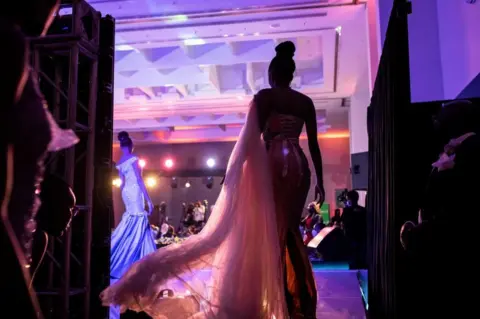 AFP A contestant gets ready backstage during the Miss Kenya beauty pageant in Nairobi, on August 28, 2021.