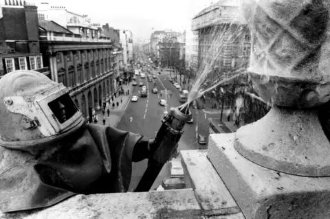 Getty Images 24th March 1977: Stone-cleaner Jack England cleaning the west front of the church at St Mary-le-Strand, London, as part of the Clean-Up London campaign for the Silver Jubilee celebrations of Queen Elizabeth II.