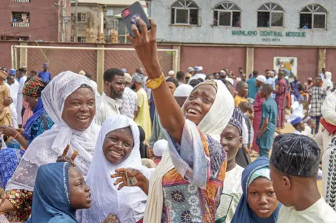 Getty Images A woman taking a selfie in Lagos, Nigeria - Monday 2 May 2022