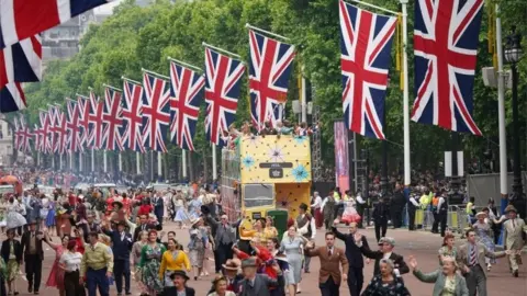 PA Media The 50"s decade dancers on the Mall during the Platinum Jubilee Pageant in front of Buckingham Palace, Londo