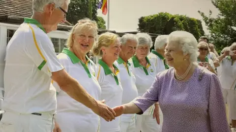 Brimfield and Little Hereford Bowling Club Brimfield bowls club members meeting the Queen