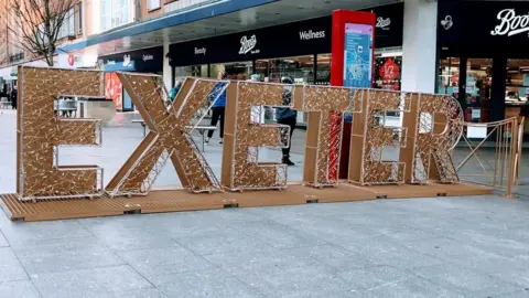 BBC Big gold 'Exeter' sign