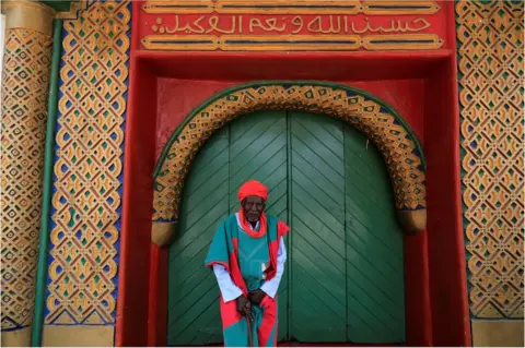 Reuters A palace guard stands in front of the Emir"s palace before the start of the Durbar festival, on the second day of Eid al-Adha celebration, in Nigeria"s northern city of Kano September 2, 2017.