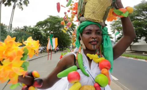 Reuters People take part in a parade during the 5th African Union - European Union (AU-EU) summit will take place is pictured in Abidjan, Ivory Coast November 30, 2017.