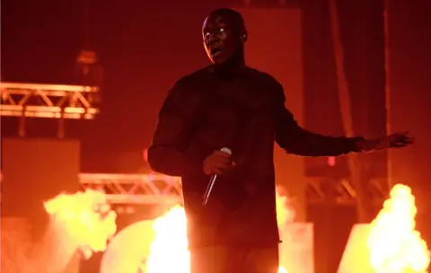 Getty Images Stormzy performs on stage at the MOBO Awards at First Direct Arena Leeds on November 29, 2017 in Leeds, England.
