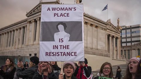 Getty Activists on the Womens March 2018 in Athens demonstrating for women's rights in the workplace (Credit: Getty)