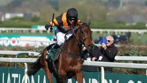 Reuters Patrick Mullins riding Nick Rockett on his way to winning the Randox Grand National Handicap Chase